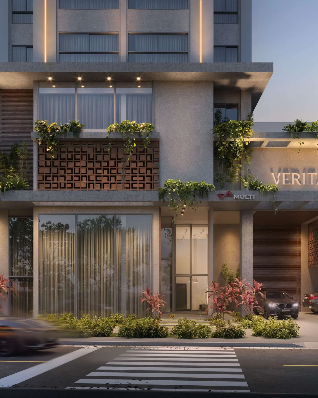 Acesso e térreo do Residencial Veritá, com brises vazados e vegetação nas sacadas